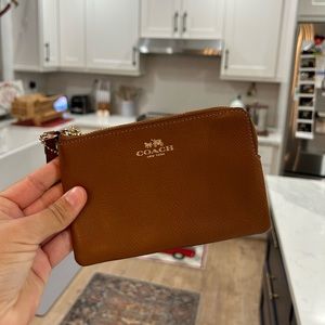 Brown coach wristlet